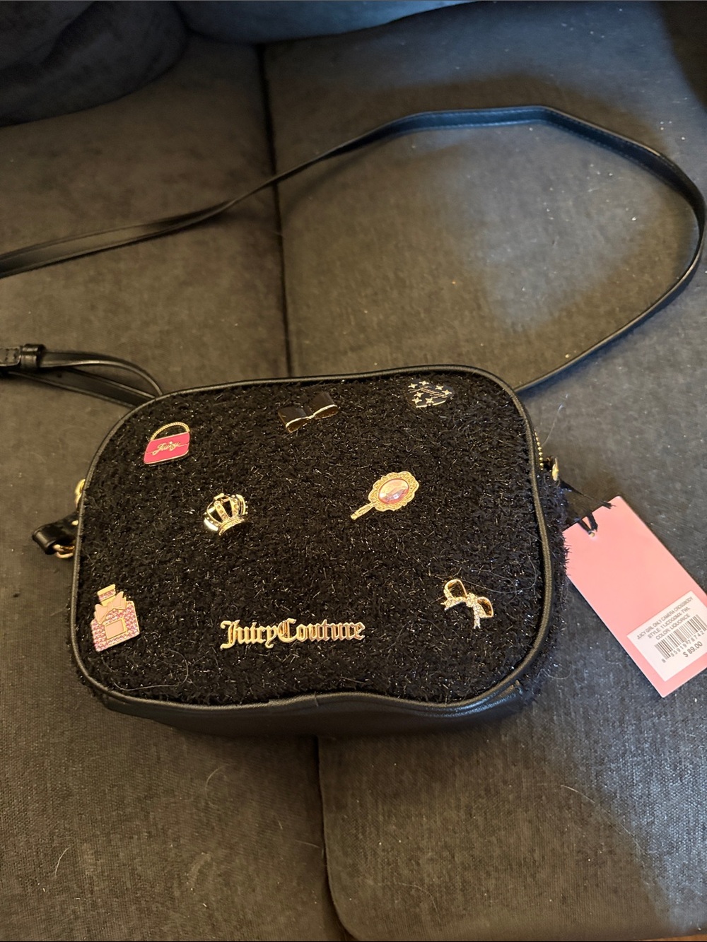Juicy Couture Black Crossbody Bag with Gold Logo and Enamel Pins
